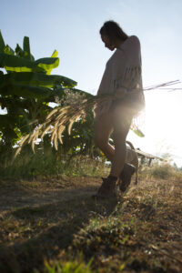 walking the organic farm to inspect the rice berries in Chiang Mai at Mala Dhara Yoga Retreat Center