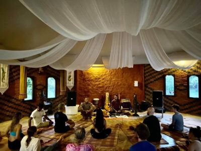 Chiang Mai yoga retreat group during small intimate gathering in Mala Dhara poolside yoga shala.